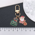 Santa Gift Sack and Green Christmas Tag Metal Clasp Keychain view 3