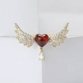 Winged Heart Metal Brooch with Crystal Wings Flanking a Heart with a Dangling Clear Drop view 4