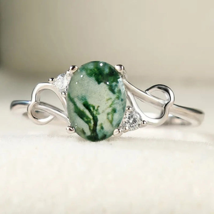 Green Patterned Oval Stone Infinity Ring In Silver Tone