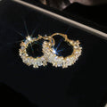 Gold Tone Crystal Paved Floral Statement Hoop Earrings view 6