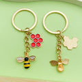 Bee and Honeycomb Charm Keychains Featuring Flower Across 47 Pictured Variations view 4