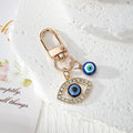 Gold Tone Blue Evil Eye Clip Charms in Eleven Designs view 3