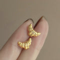 Textured Gold Croissant Crescent Stud Earrings With Metal Details view 1