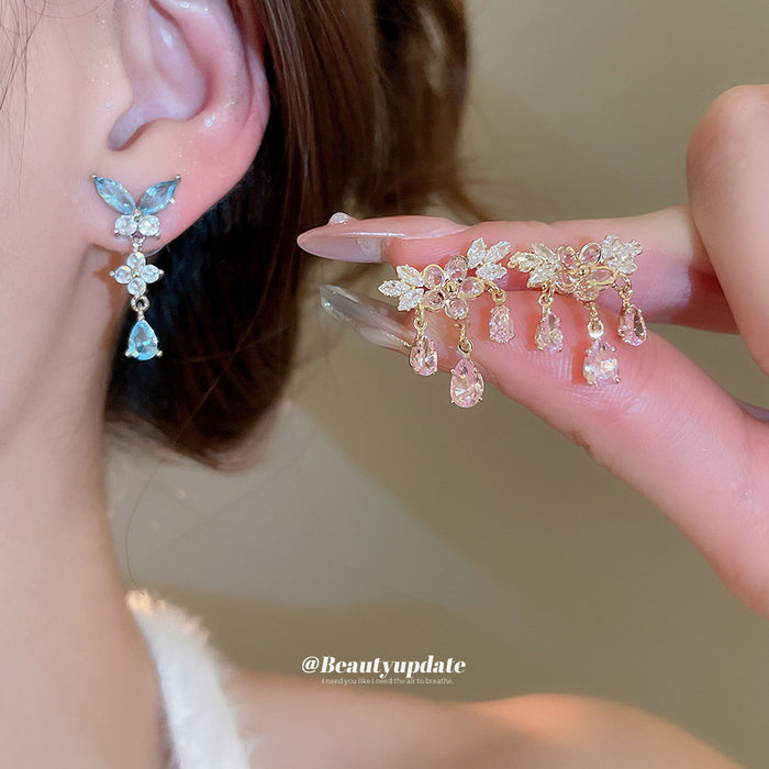Pink Crystal Butterfly Drop Earrings with Reflective Details