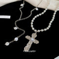 Layered White Pearl Look Cross Pendant Necklace with Metal Tone Details view 2
