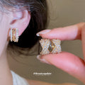Triple Row Crystal C Hoop Clip On Earrings With Polished Metal Details view 2