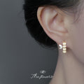 Gold Glass Cats Eye Bamboo Segment Stud Earrings CZ Leaves view 2