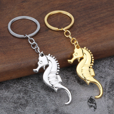 Gold-tone and silver-tone seahorse keychains