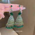 Green Crystal Peacock Chandelier Drop Earrings with Polished Metal Accents view 1