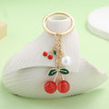 Cherry Keychain With Round Bead In Four Red And Black Styles view 1
