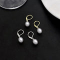 Gold and Silver White Pearl Look Drop Huggie Earrings view 1