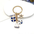 Blue Nautical Lifebuoy Anchor and Sailboat Keychain Set view 2