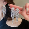 Silver Tone Crystal Tiered Fringe Stud Earrings With Decorative Metal Accents view 3