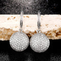 Crystal Pave Disc Drop Earrings in Silver Tone Polished Metal Earrings view 1
