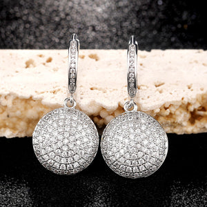 Crystal Pave Disc Drop Earrings in Silver Tone Polished Metal Earrings