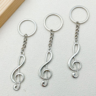 Image 1 showing music note keychain.