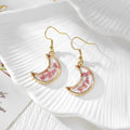 Gold Tone Crescent Moon Pressed Flower Drop Earrings in Eight Designs view 3