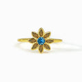 Gold Tone Flower Ring With Blue Center and Green Petals view 5