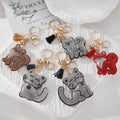 Rhinestone Fox Cat and Dog Tassel Clip Keychains in Five Designs view 1