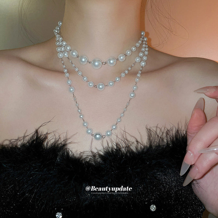 White Pearl Look Layered Necklace with Silver Tone Butterfly