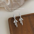 Silver Ribbon Bow Drop Earrings With Lace-Up Stud Top view 4