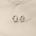 Silver Star Huggie Hoop Earrings Black Enamel Crystal Stars view 2