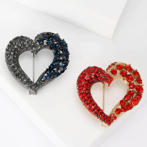 Black blue and red open heart rhinestone brooches paired on white blocks