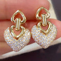 Gold Tone Double Heart Drop Earrings with Crystal Pave view 2
