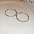 Round Hoop Earrings in Assorted Textures and Sizes view 10