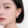 Gold Geometric Star Texture Huggie Hoop Earrings Pair view 2