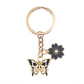 Gold Tone Butterfly Skull and Sakura Flower Clip Keychains view 7