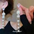 Silver Tone Pearl Drop Earrings With Fine Chain Tassels view 1