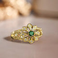 Gold Tone Openwork Flower Ring Green Center Stone Sizes 6-10 view 1