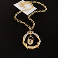 Sculpted Lips Pendant Necklaces in Three Metallic Finishes view 3