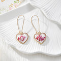 Gold Tone Heart-Shaped Pressed Flower Drop Earrings in Six Designs view 6