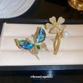 Blue Shell Like Butterfly Brooch And Gold Bear Letter M Brooch view 1