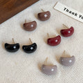 Glossy Oval Stud Earrings In Brown And Red In Two Color Options view 3