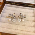 Bow Flower and Pearl Drop Ear Clips in Gold and Silver view 6
