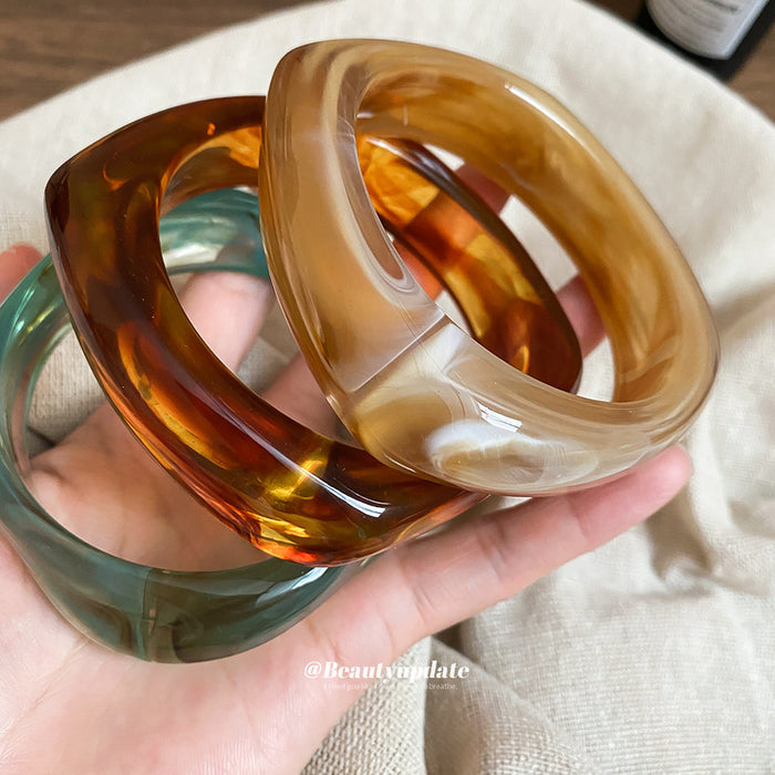 Three Thick Irregular Resin Closed Bangles In Teal Amber Or Taupe