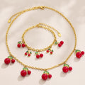 Red Cherry Charm Necklace and Bracelet in Gold Tone view 2