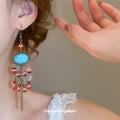 Turquoise Oval Beaded Chandelier Earrings With Red Accents view 3