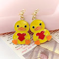 Yellow Heart-Holding Duck Lobster-Clasp Charm with Gold Tone Finish view 4