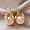 Crystal Swirl Pearl Style Stud Earrings with Metal Settings view 1