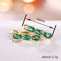 Green Oval Three-Stone Long Drop Earrings In Polished Gold Tone view 4