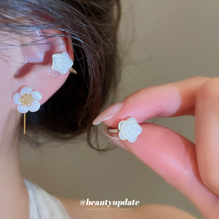 White Flower Hook Earrings in Silver and Gold with Polished Metal Details