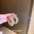 Wide Gold Tone Crystal Pave Hoop Earrings With Polished Metal Tone Details view 1