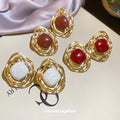 Round Enamel Statement Stud Earrings With Wavy Gold Tone Frames view 3