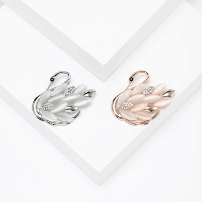 swan with crystal flower brooch group view