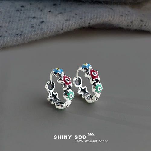 Silver oxidized multi color enamel flower star mini hoops on gray