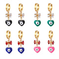 Gold Tone Bow and Heart Evil Eye Huggie Drop Earrings view 5